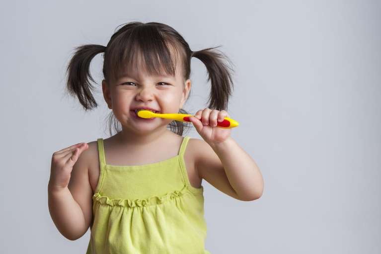 A child brushing her teeth in Maple Ridge, BC